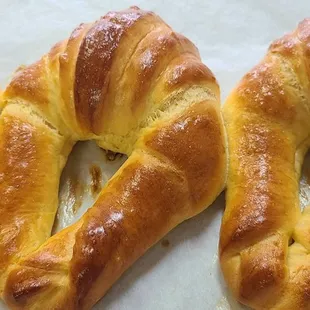 three freshly baked croissants