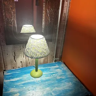 a table with a lamp on it