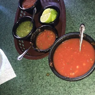 two bowls of salsa and tortillas