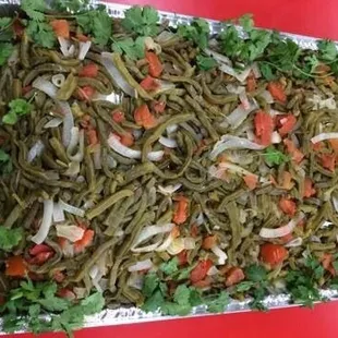 a tray of green beans and carrots