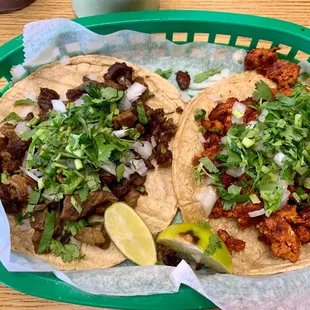 two tacos on a tray