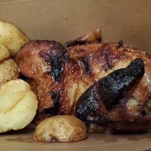 (1/2 order shown) $28 for a rotisserie chicken and a side of potatoes. 9/24/2021