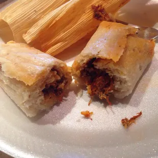 two tamales on a plate
