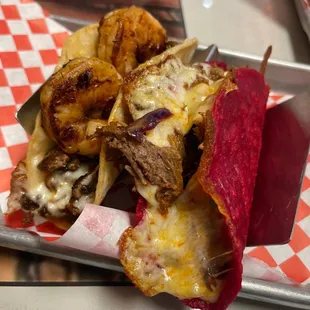 Surf N' Turf Quesotaco and hot Cheetos Quesabirria