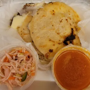 Delish papusa with coleslaw topping