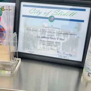Certificate which resembles the grand opening on  November 1st of 2024 which was on a Friday.
