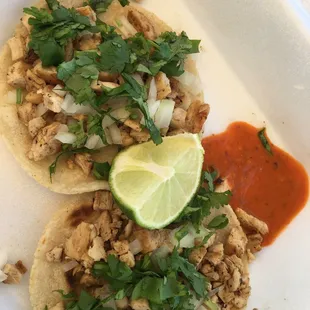 Chicken tacos with red salsa