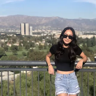 Kim E.