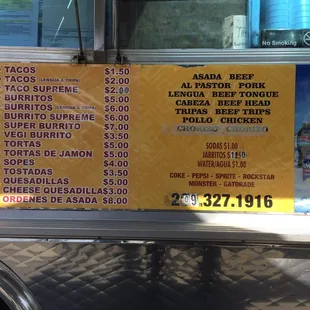 a menu on a food truck