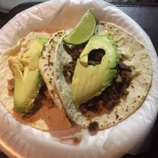 Beef Fajita Taco &amp; Chicken Fajita Taco with added avocado and cheese.