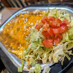 large, heavy shredded beef burrito with green chile, but the oafish photo mostly captured the garnish