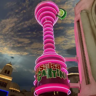 the neon sign for the restaurant