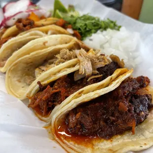 Trying them all. Favorites: Carne Asada and al Pastor.