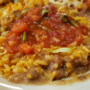 Yep, I mix the rice and beans together and top with the salsa, you should try it