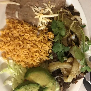 Bistec encebollado