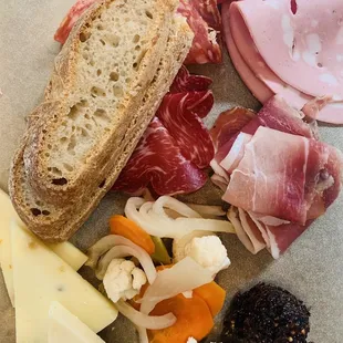 a variety of meats and cheeses