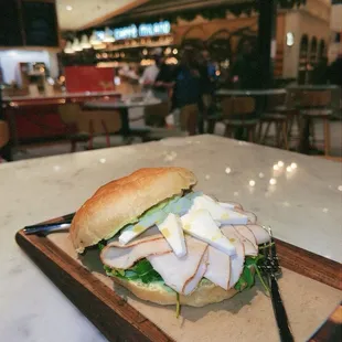 Panino (focaccia, turkey, mozzarella, basil aioli, arugula)