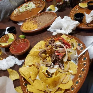 a table full of mexican food