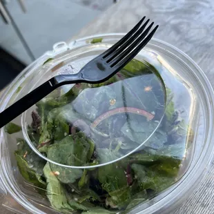 Half eaten Mediterranean salad