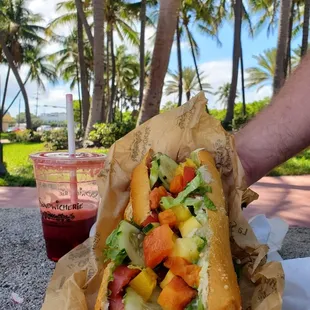 The Tropical Hummus vegan sandwich, The Underground juice with carrot, celery, beet and apples.