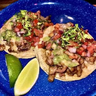 Carne asada and cheese tacos