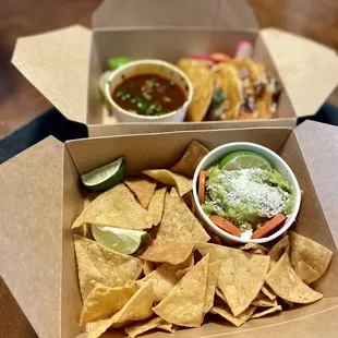 two boxes of tortillas and guacamole