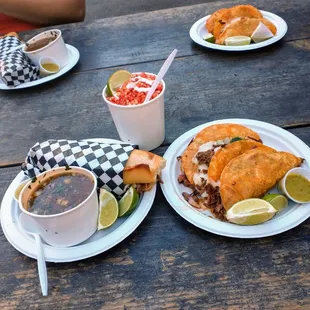 Left- torta birra(beef) Right- red tacos (beef) Center- Elote (corn)