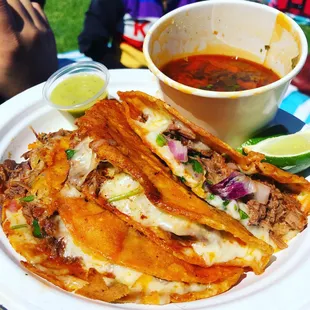 Red Birria tacos with consomé