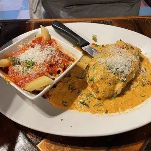 a plate of pasta and a bowl of sauce