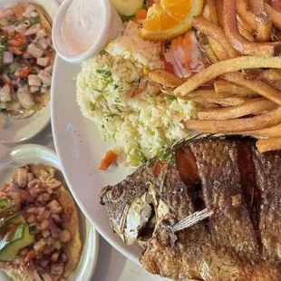 Mojarra frita, fish tostada, and octopus tostada