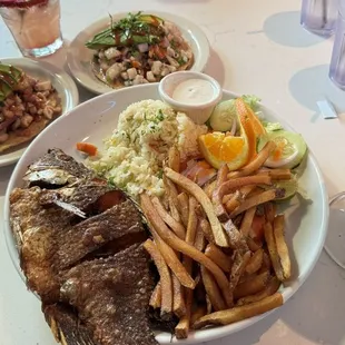 Mojarra, tostadas, margarita, and tamarindo vodka