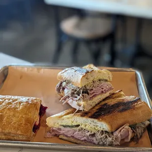 Cuban sandwich $11.99 with guava + cheese pastry $3.60