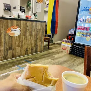  person holding a cup of coffee