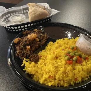 Picadilla &amp; yellow rice w/ black beans and Cuban bread.