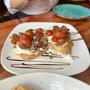 Bruschetta (fresh ricotta cheese, cherry tomatoes, basil, olive oil, balsamic reduction)