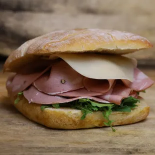 Mortadella - moetadella, arugula, tomato, prvolone, pistachio cream.