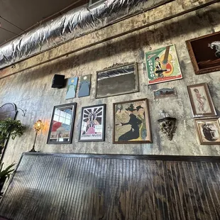 a wall full of pictures