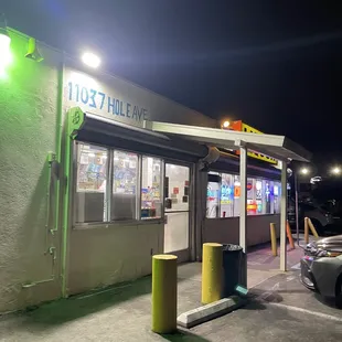 a car parked in front of the store