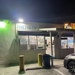 a car parked in front of the store