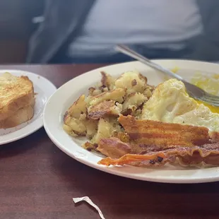 Egg Special with potatoes and sourdough toast! Only place that gives you 4 pieces!