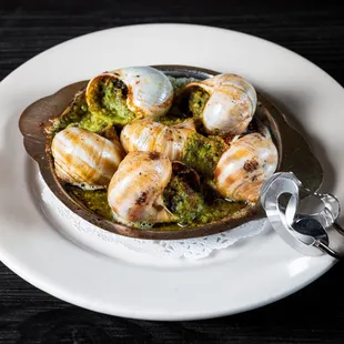 Escargots a la Bourguignonne. Roasted Escargots with Butter, Garlic, Shallot and Parsley.