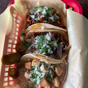 Bottom to top -  Pollo Taco, buche taco, pastor taco