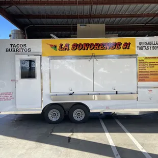 a food truck parked in a parking lot
