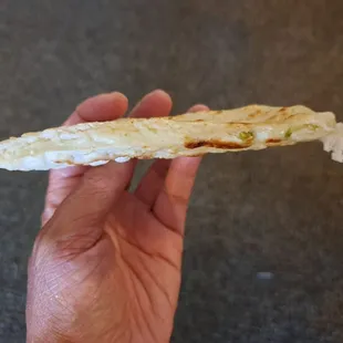 Inside a loroco pupusa
