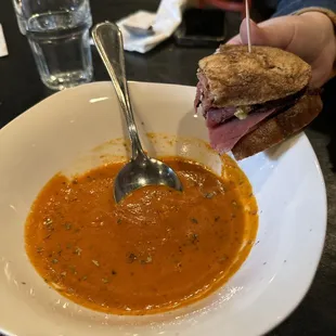 Red pepper Gus&apos;s soup and pastrami sandwich.