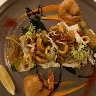 FRITTO DEL PESCATORE..... Fried calamari, shrimp, zucchini, sundried tomato, romesco, and tartar sauce