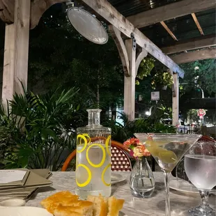 Complimentary bread and oil, with a perfectly made dry martini