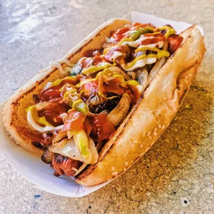 a hot dog with toppings