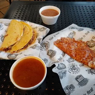 Quesabirrias, one with cheese for the taco shell.