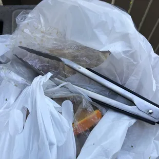  pair of scissors in a plastic bag